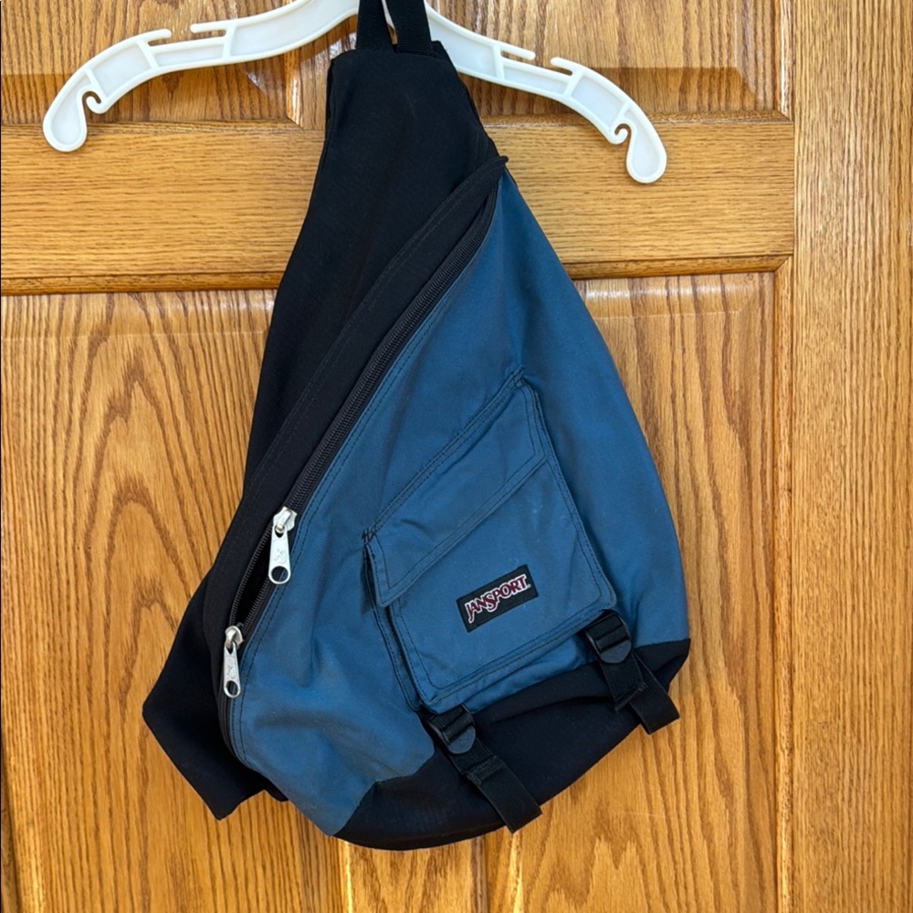 JanSport Blue and Black Backpack Durable Design